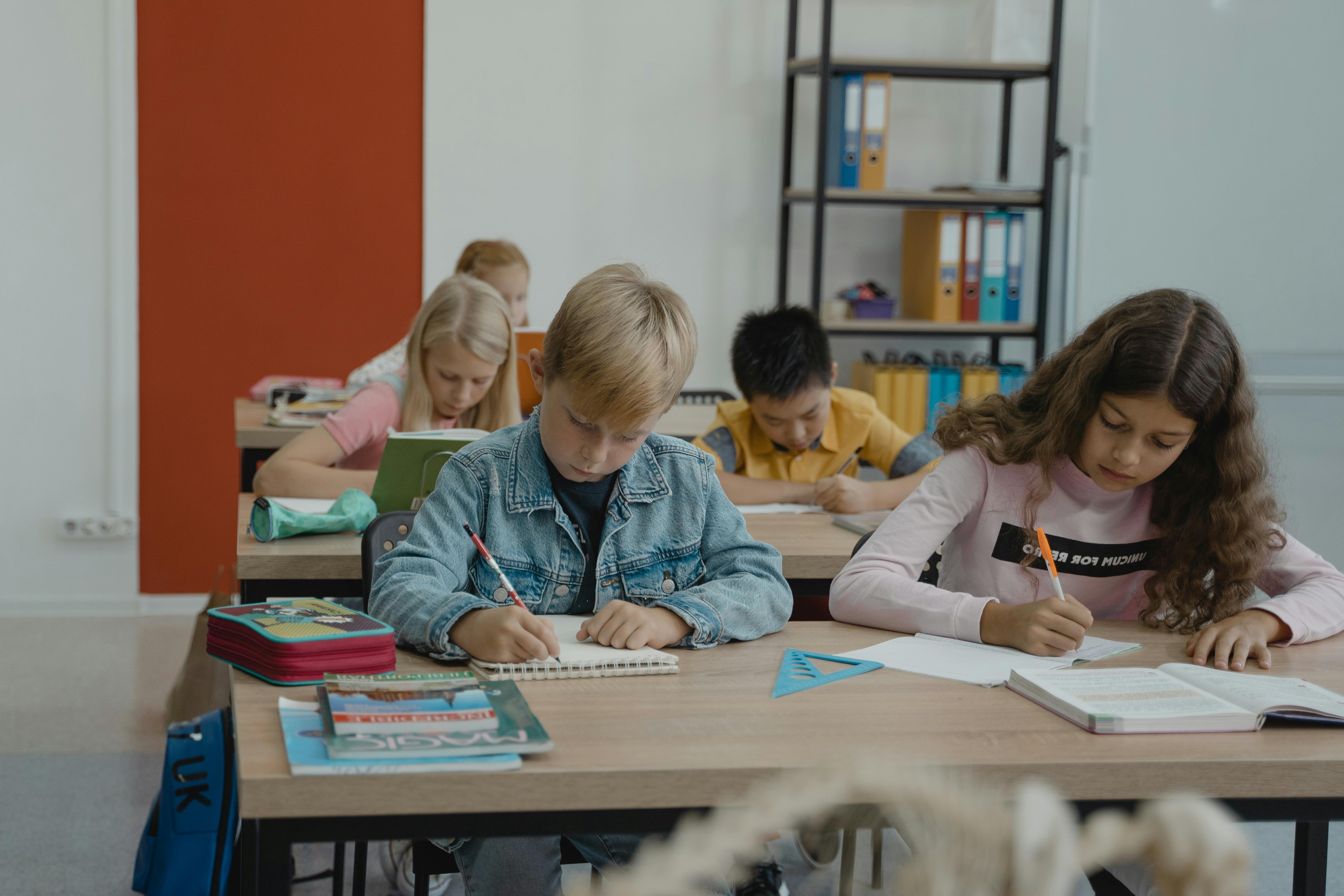 Students focused on learning while working at desks in a classroom